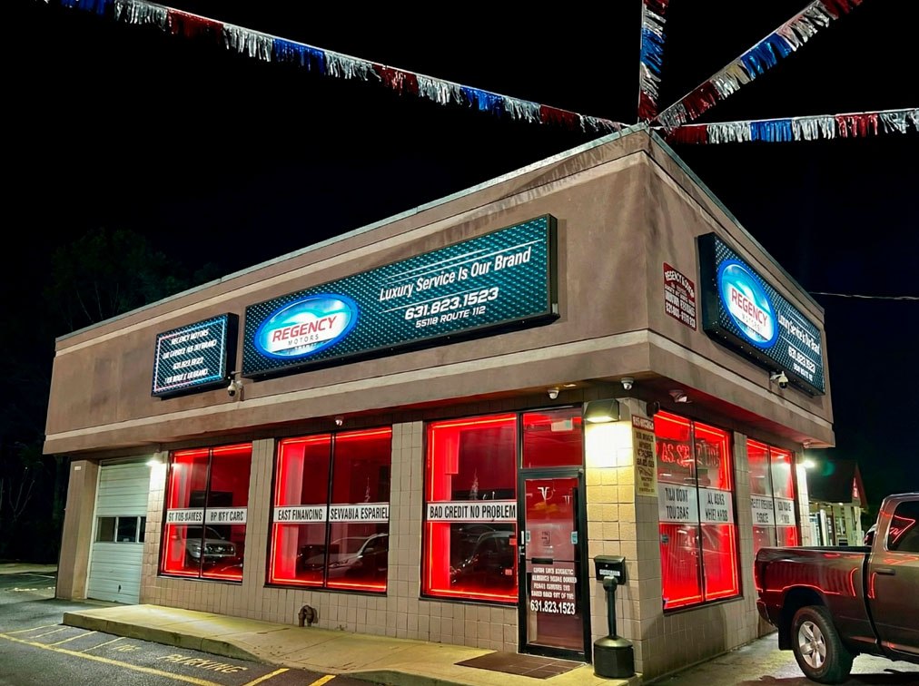 Late-model vehicles on a scenic road